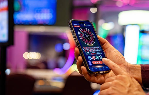 Live Ikan Jackpot table interface on mobile device showing fishing scenario and betting controls